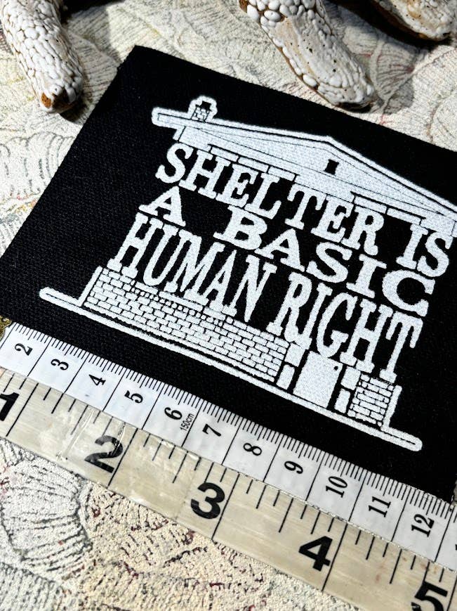 Shelter is a basic human right patch.
