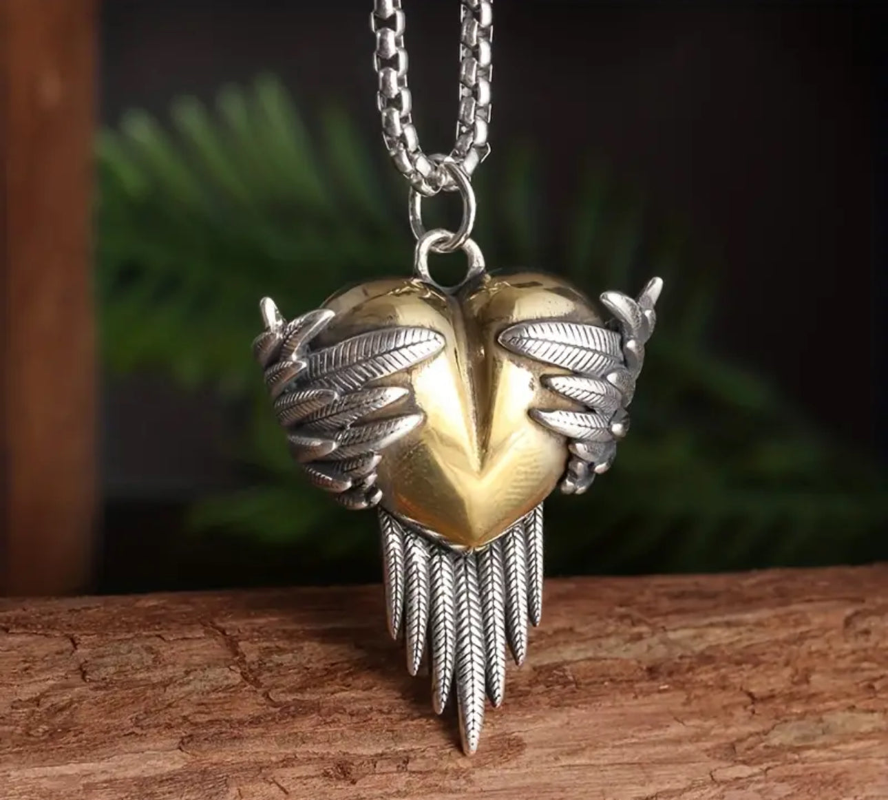 Bird Wing Wrapped Golden Heart Necklace