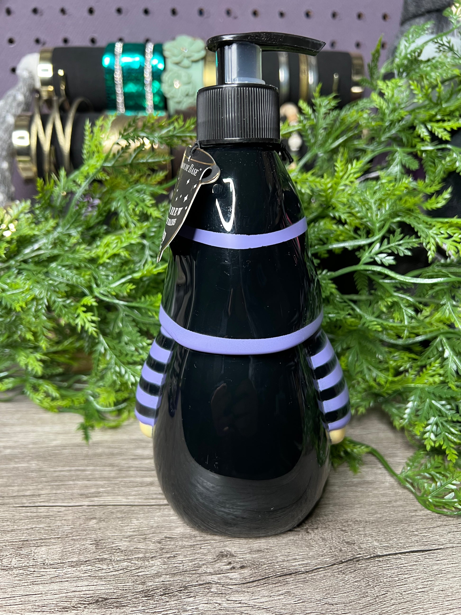 Halloween-themed gnome-shaped hand soap dispenser in purple and black