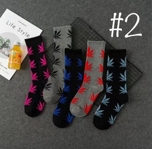 Assorted men's crew socks featuring a cannabis leaf design, suitable for sizes 6-10